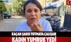 Kaçan şahsı tutmaya çalışan kadın yumruk yedi